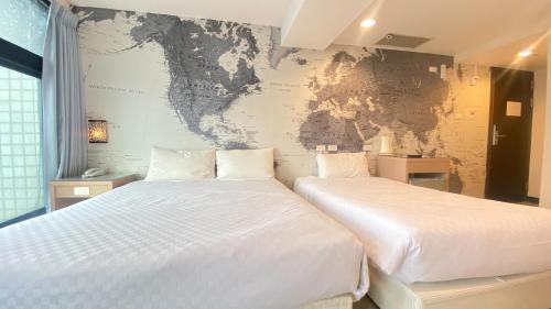 Postel nebo postele na pokoji v ubytování New Generation of Boutique Business Hotel