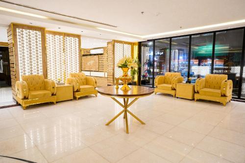 Χώρος καθιστικού στο Lambert ApartHotel