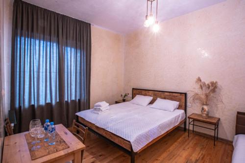 Ένα ή περισσότερα κρεβάτια σε δωμάτιο στο casa akacia