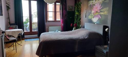 Cama o camas de una habitación en Bruges Grande Place