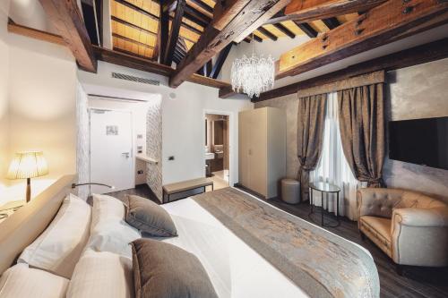 Posteľ alebo postele v izbe v ubytovaní Hotel Aquarius Venice - Ascend Collection