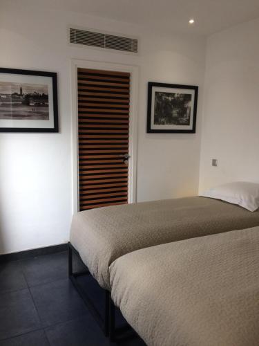 Postel nebo postele na pokoji v ubytování Riad Love B&B