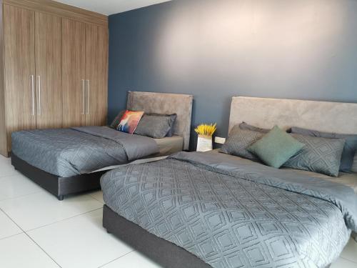 KSL D'Esplanade Cozy Suite at Johorにあるベッド