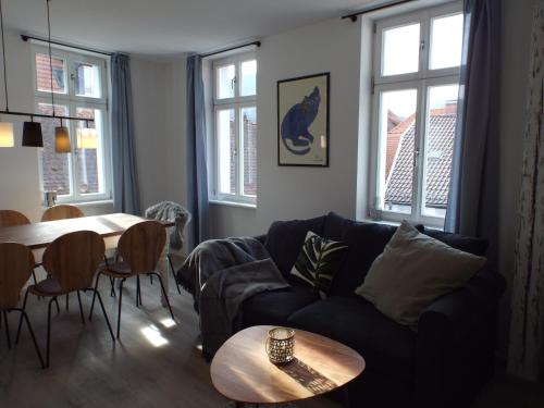 Posezení v ubytování Ferienwohnung Mittendrin mit Parkplatz