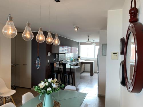 Una cocina o zona de cocina en Tantum Concon Apartment