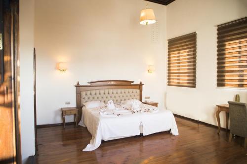 Ένα ή περισσότερα κρεβάτια σε δωμάτιο στο Thrace Konak Hotel & SPA