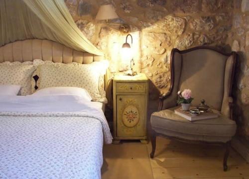 Tempat tidur dalam kamar di Elaion Guesthouse