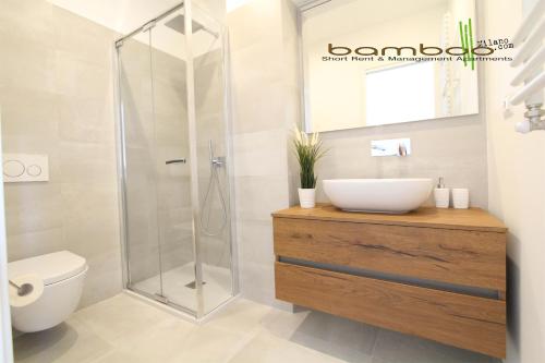 Een badkamer bij Bamboo Milano Zezon Plus Apartment