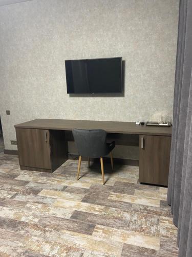 TV a/nebo společenská místnost v ubytování Bridge