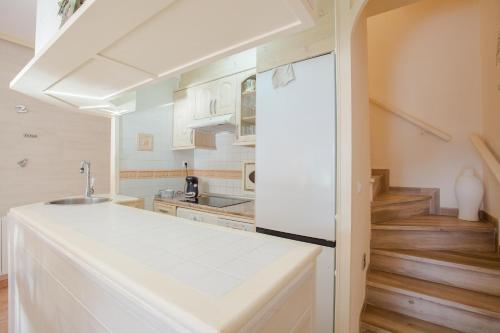 a kitchen with a sink and a counter top at BayMar by MarCalma in Montroig
