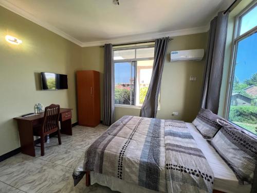 Postel nebo postele na pokoji v ubytování PHYLLEN HOTEL