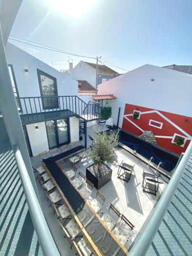 an overhead view of a balcony with chairs and tables at Villa Rio by Valada Village in Valada