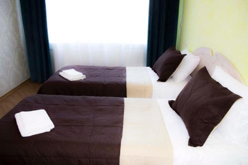 Voodi või voodid majutusasutuse Lovely 2-bedroom Flat in Šiauliai toas