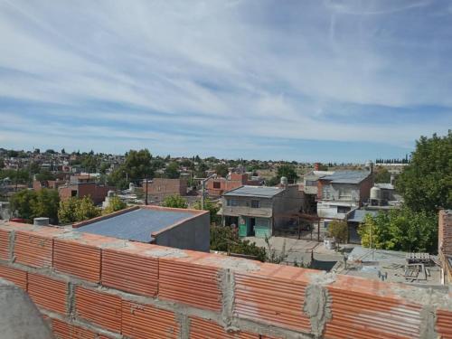 a view of a city from a brick wall at Lo de Juana in Trelew