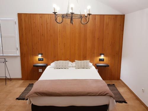 Кровать или кровати в номере Quinta das Candeias