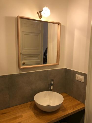 a bathroom with a white sink and a mirror at BBCasablu in Acireale
