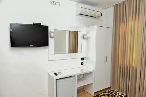 TV a/nebo společenská místnost v ubytování Hotel Tomorri