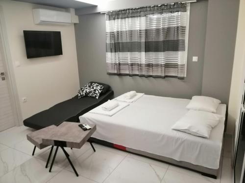 Ένα ή περισσότερα κρεβάτια σε δωμάτιο στο Premium apartman Family