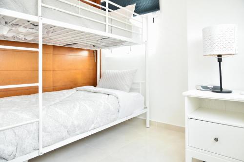 Postel nebo postele na pokoji v ubytování Apartamento en Juan Dolio Tepuy 501 B