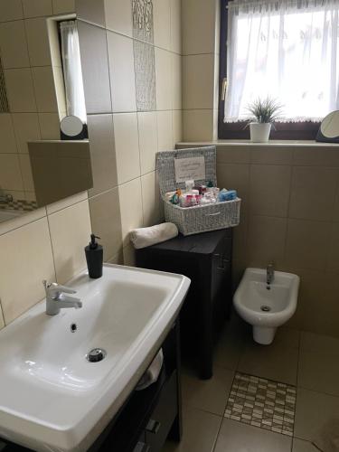 Kúpeľňa v ubytovaní Domek pod Czantorią