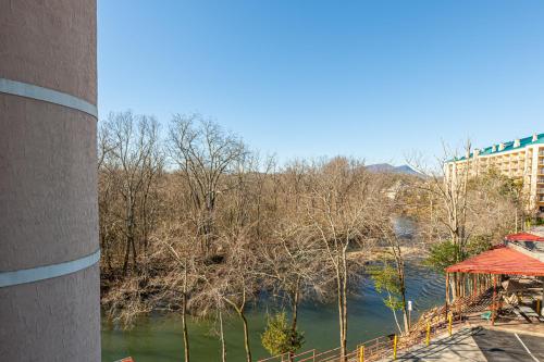 a view of a river from a building at River Bend Inn - Pigeon Forge in Pigeon Forge