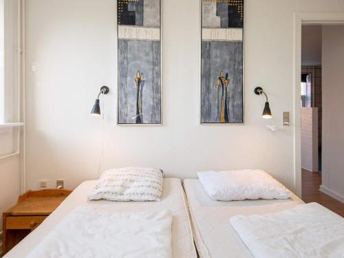 מיטה או מיטות בחדר ב-4 person holiday home in Ansager