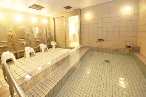 The swimming pool at or close to Kuretake Inn Premium Numazu Kitaguchi Ekimae