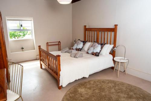 Una cama o camas en una habitación de Amande Guesthouse