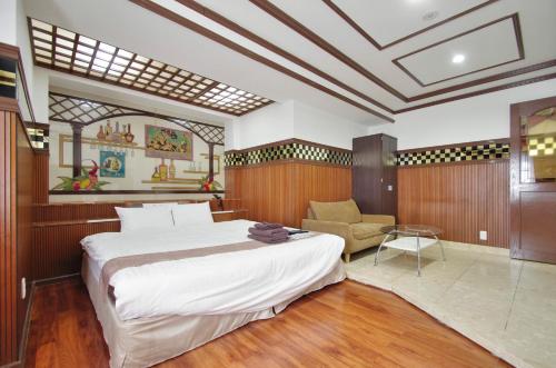En eller flere senge i et værelse på Hotel Imalle Yokohama Isezakicho
