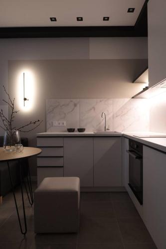 Кухня или мини-кухня в Residential complex New England
