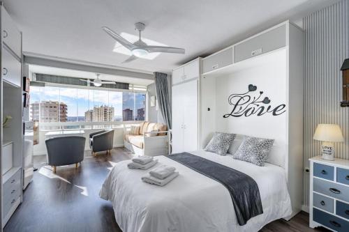 A bed or beds in a room at Studio Playa Paraíso