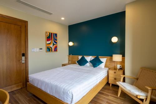 Postel nebo postele na pokoji v ubytování Sline Hotel and Apartment