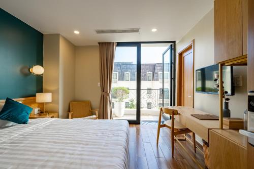 Postel nebo postele na pokoji v ubytování Sline Hotel and Apartment