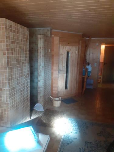 a bathroom with a toilet in a room at Hotel Garni in Westerheim