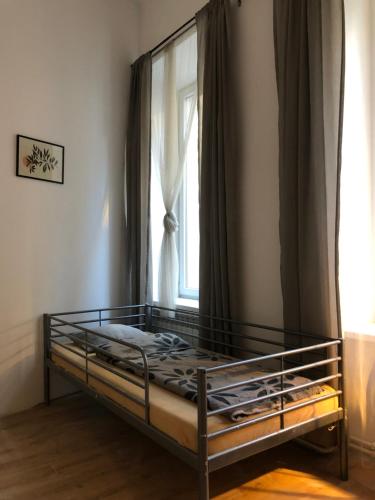 En eller flere senge i et værelse på Caramba