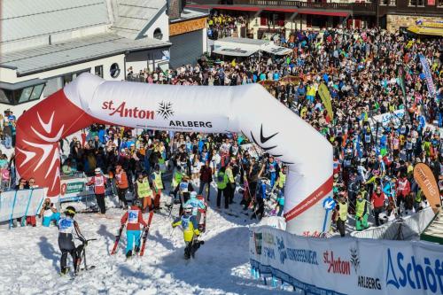 a large crowd of people at a ski race at Golden Peak in Sankt Anton am Arlberg
