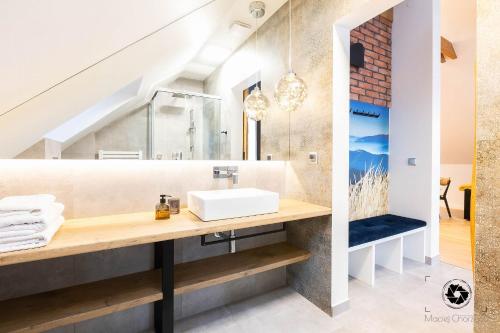 Koupelna v ubytování Liliowy Apartament