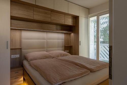 Postel nebo postele na pokoji v ubytování Bled4U Apartment