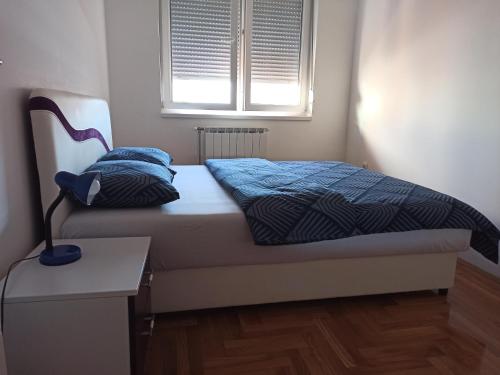 Кровать или кровати в номере BK Apartment, Istocno Sarajevo, Lukavica