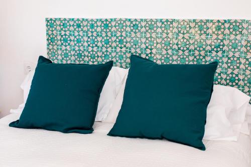 En eller flere senge i et værelse på HN El Palomar