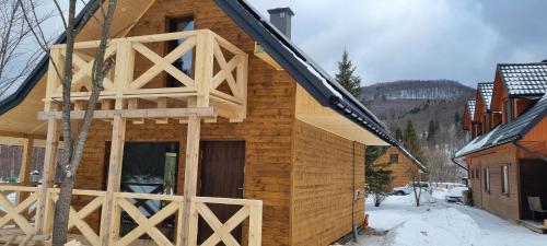 a house under construction in the snow at Leśniczówka Kalina in Wetlina