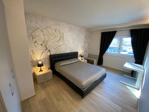 Voodi või voodid majutusasutuse Emilius Suite toas