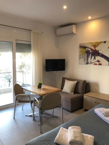 Μια τηλεόραση ή/και κέντρο ψυχαγωγίας στο Vanessa House Luxury Apartments