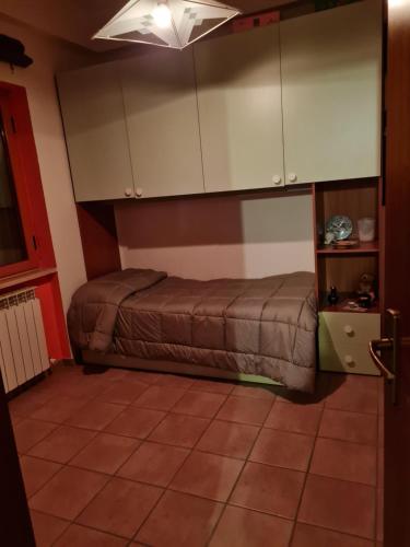 Ein Etagenbett oder Etagenbetten in einem Zimmer der Unterkunft A casa di Maria
