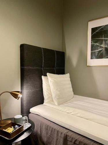 Кровать или кровати в номере Unique Hotel
