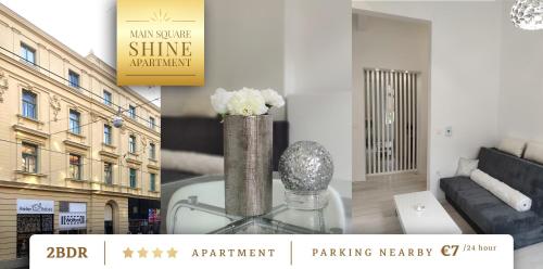a living room with a couch and a vase with flowers at Luxurios and historic apartment "Shine" - right on the Main Square in Zagreb