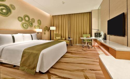TV a/nebo společenská místnost v ubytování Holiday Inn Chengdu Qinhuang by IHG