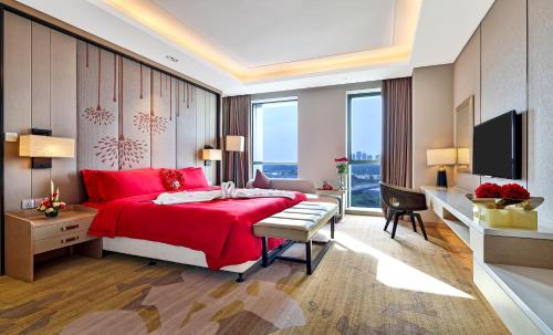 Postel nebo postele na pokoji v ubytování Holiday Inn Chengdu Qinhuang by IHG