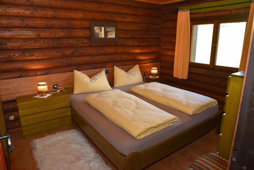Postel nebo postele na pokoji v ubytování Berghütte Ahrntal