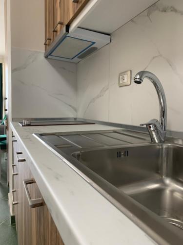 Kuchyň nebo kuchyňský kout v ubytování Eri Apartments 4